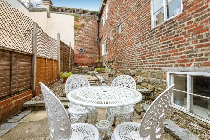 Whitby cottages with garden, Pet friendly cottage in Whitby, Whitby holiday accommodation with outdoor seating.