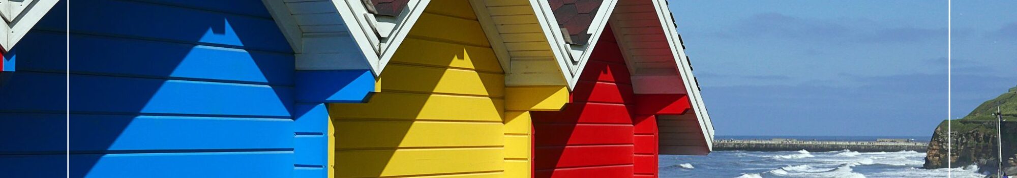 Colourful beach huts in Whitby